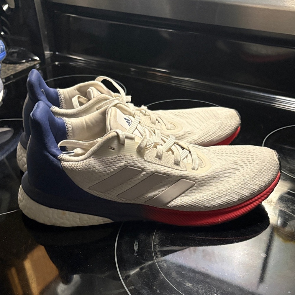 adidas Men's Cream Knit Athletic Shoes with Blue Heel and Red Outsole